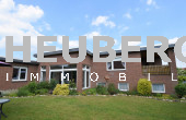 VERKAUFT --- Bungalow mit unterkellertem Anbau, Wintergarten und zwei Garagen